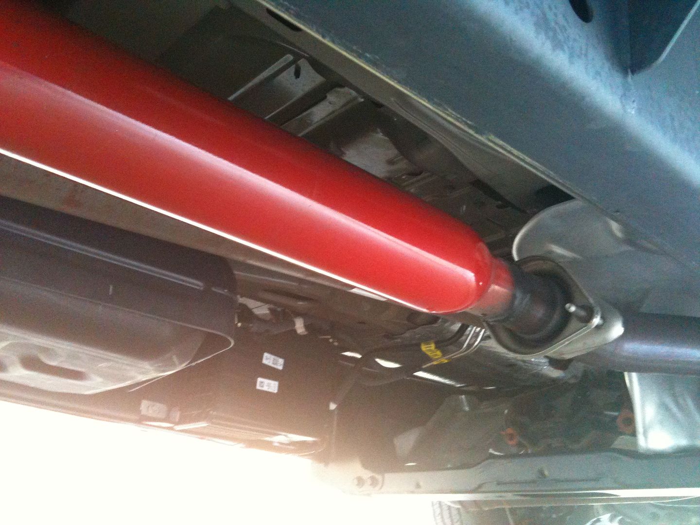 Side exit exhaust in front of rear tires what about driver's side