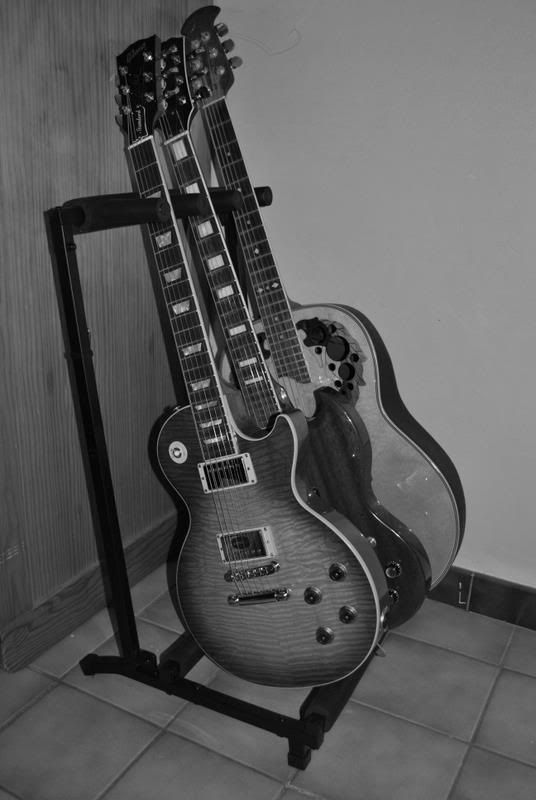 Does hanging a guitar from the neck/headstock do damage? Page 3 My