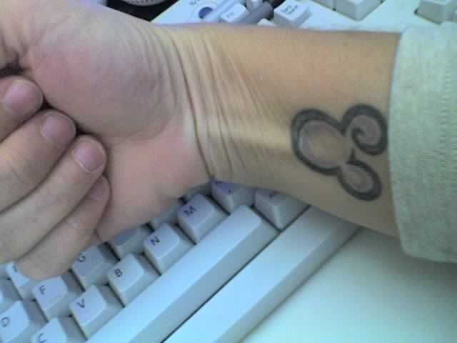 this reminds me of my mickey tattoo! Although mine came from a pair of